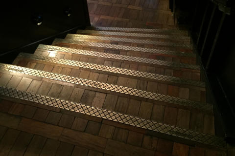 Hawksmoor Cast Nickel Bronze anti-slip stair nosings.
